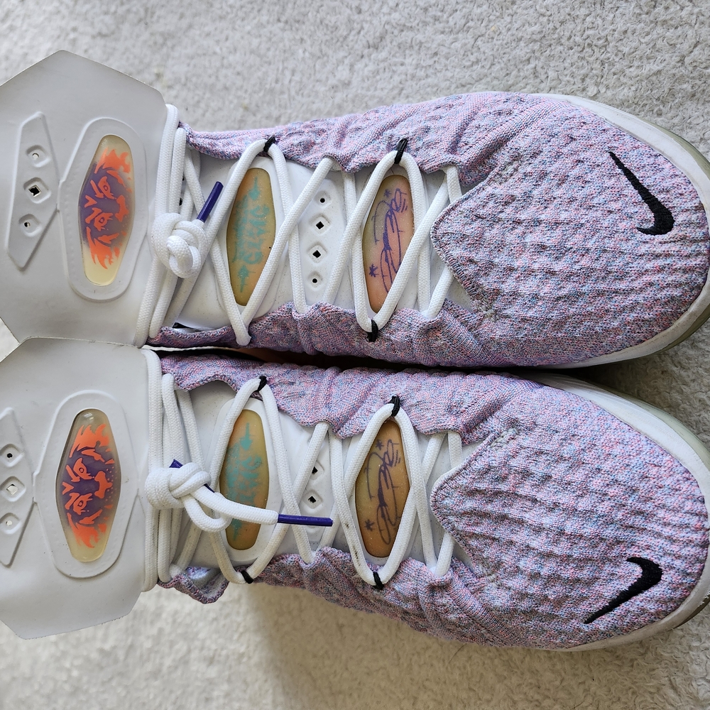 Nike Pink and White Athletic Shoes with Textured Upper